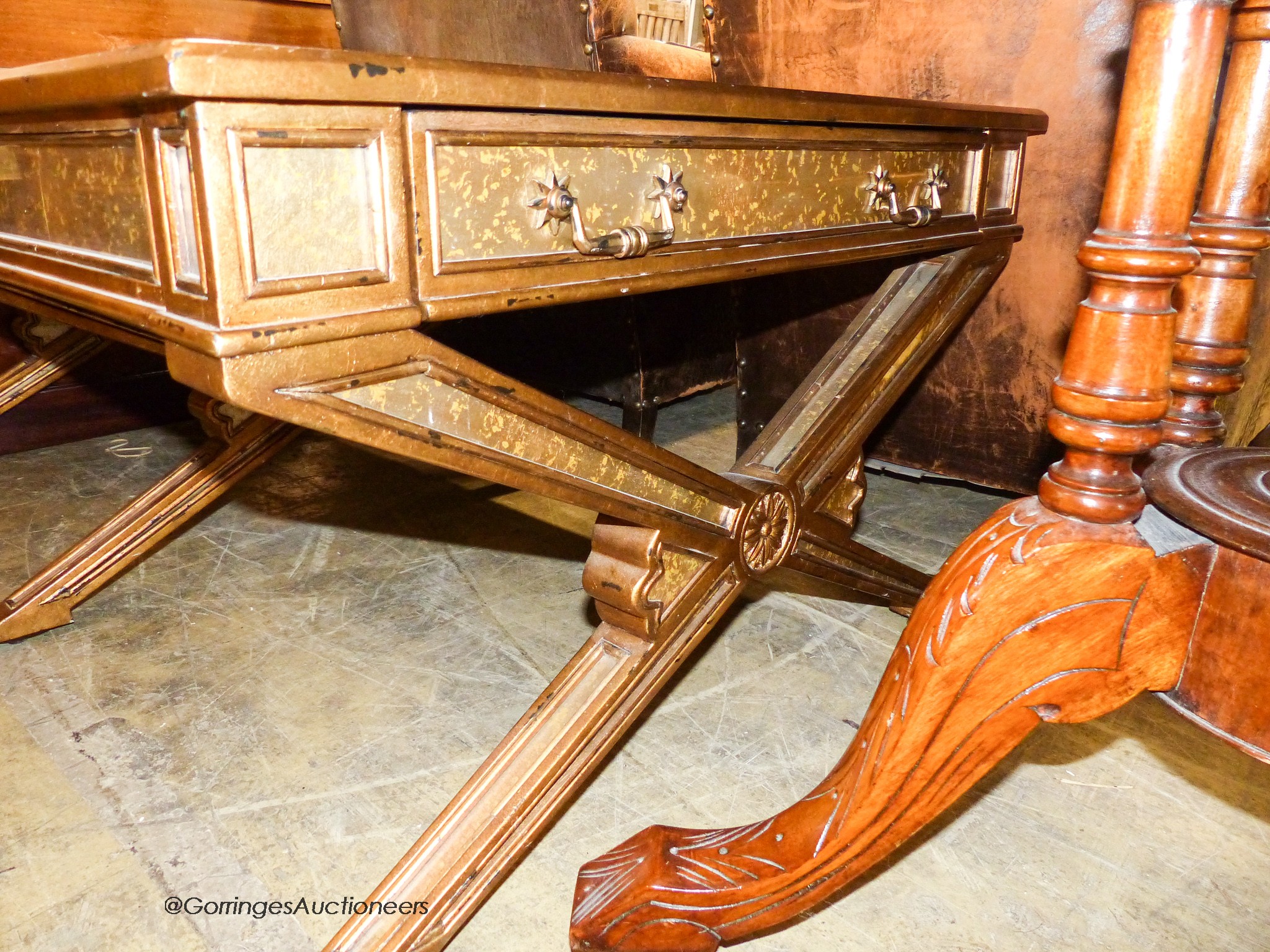 An Italian style gilt and glass 'X' frame coffee table fitted end drawers, length 132cm, depth 80cm, height 51cm